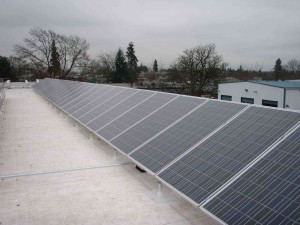flat composite roof install 65 sharp 208 watt modules tilted