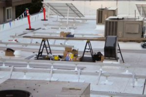sun auto shop install progress roof